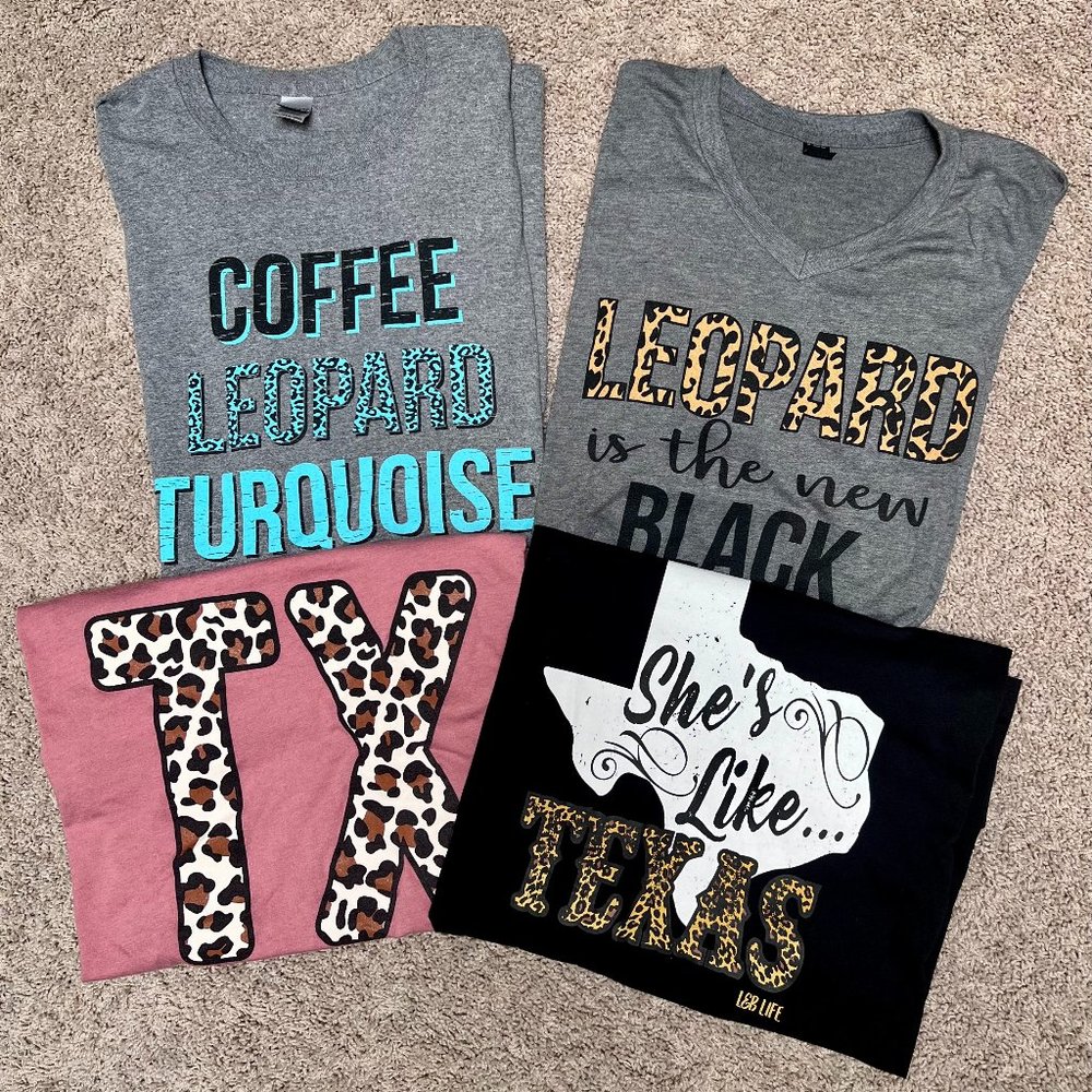 $100 worth of various leopard print ladies T-shirts in sizes 2 (XXL) 2 (XL)
